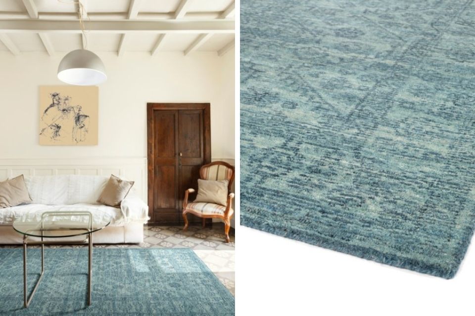 Blue area rug with white couch in contemporary room